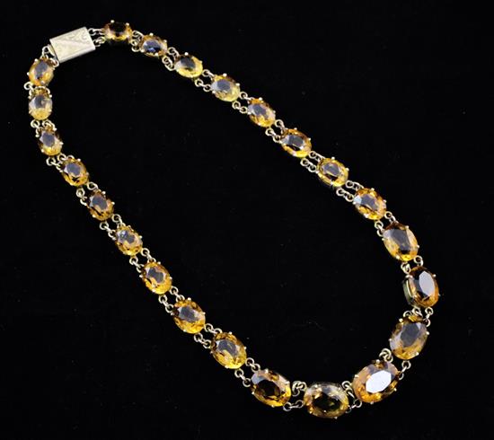 An early 20th century 9ct gold and citrine necklace, 14.5in.